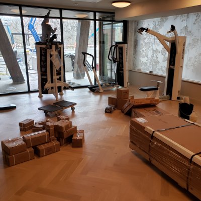 Unpacking and unloading gym equipment